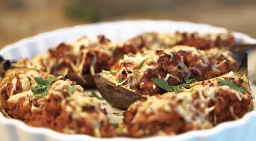 Batata gratinada con carne de conejo